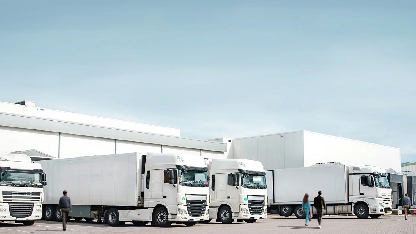 Two white trucks