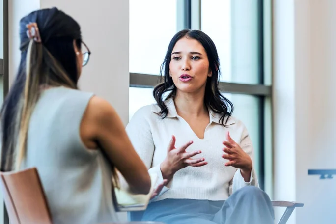 two women talking