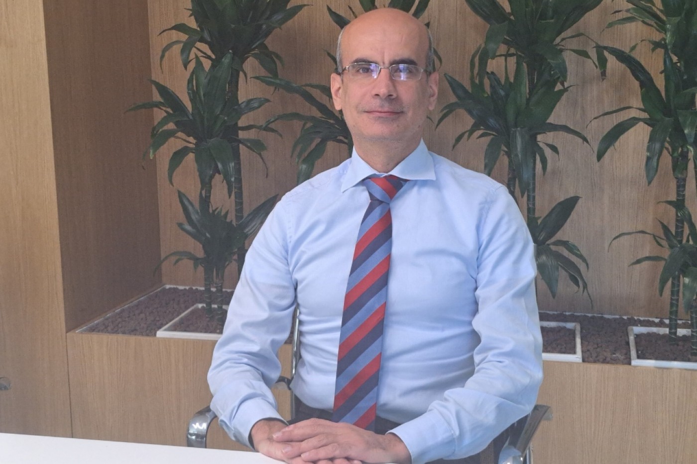 Portrait of Fjorent Rrushi, Head of Research, Raiffeisen Bank Albania