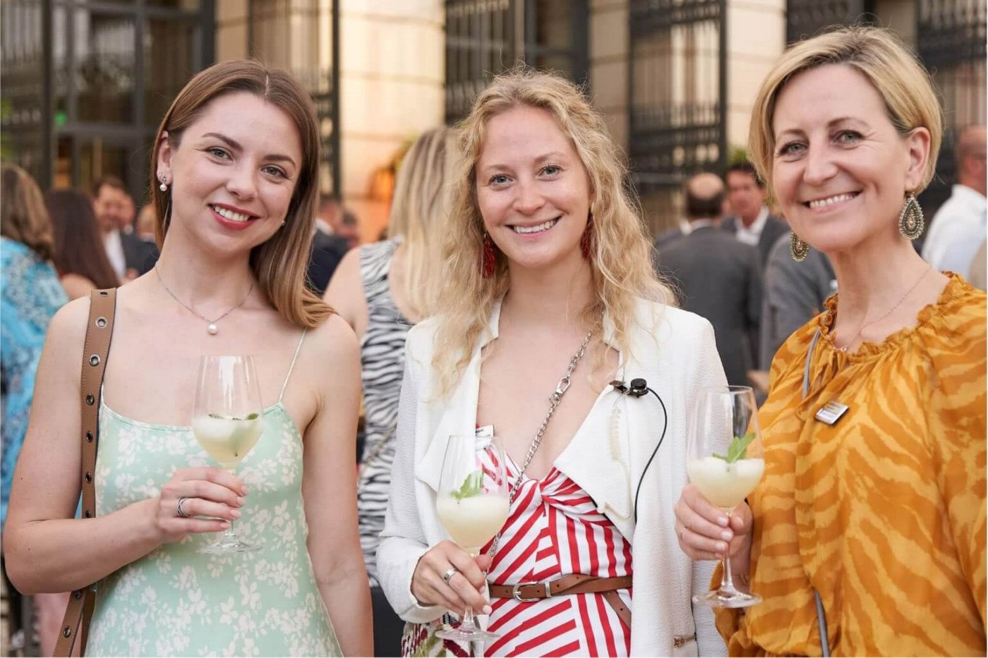 three women with cocktails
