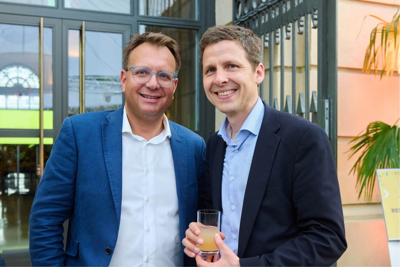 two smiling business men