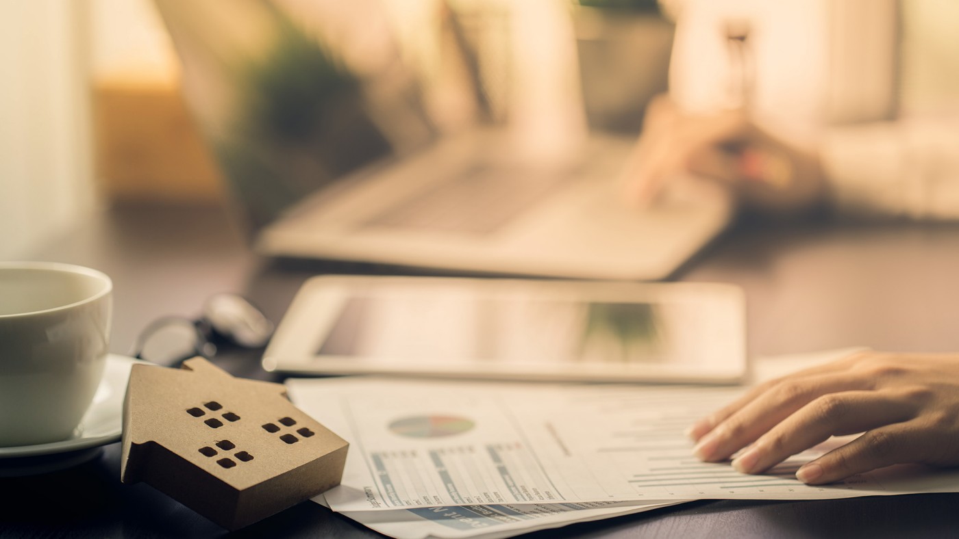 Ipads and finance paper on the table