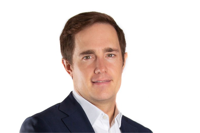 Porträtbild, John Carlson, Leiter Group Investors Relations